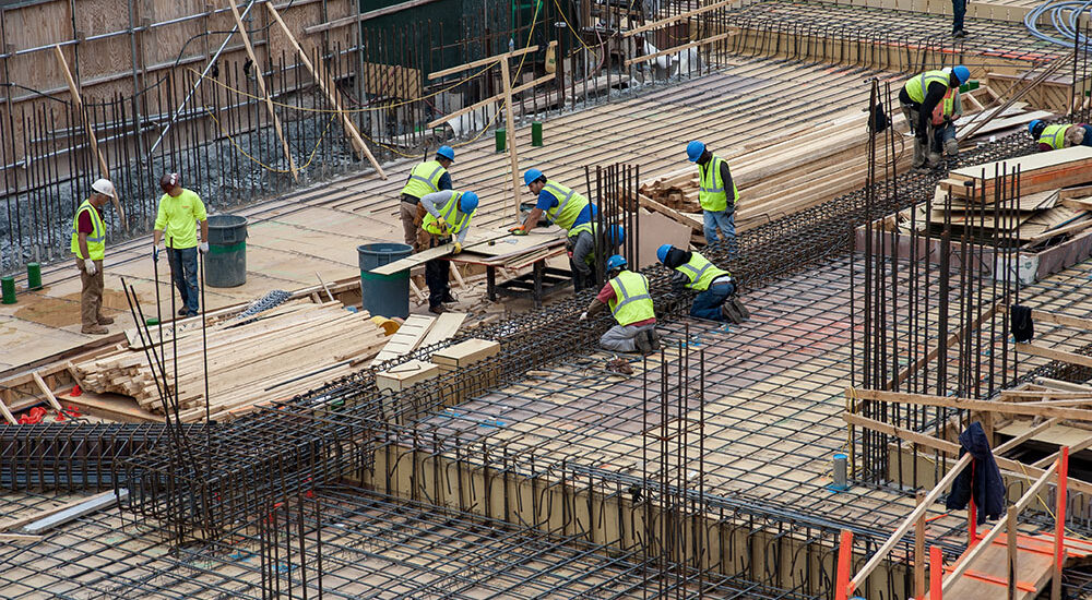 New York City, New York - May 18, 2015: Urban Scene Day, Construction Site Workers duing thair everyday hard job in New York City.